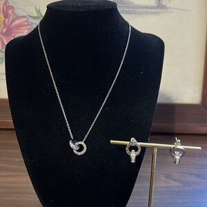 stainless steel interlocking roman numeral necklace and earring set
